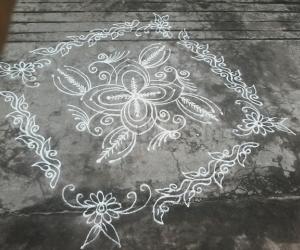 Freehand flower rangoli