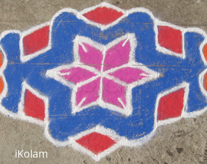 Rangoli: Magenta star