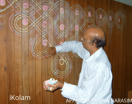 Rangoli: Kolam using pieces of chalk