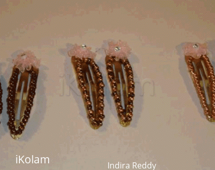 Rangoli: Hair clips decorated with beads 