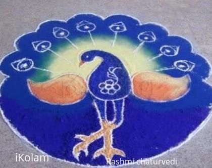 Rangoli: Enchanting colors of a peacock.