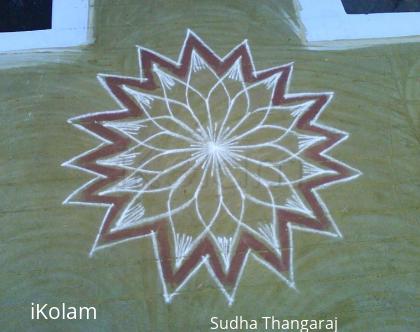 Rangoli: line kolam. by putting thin lines in the form of arc this kolam is finished.