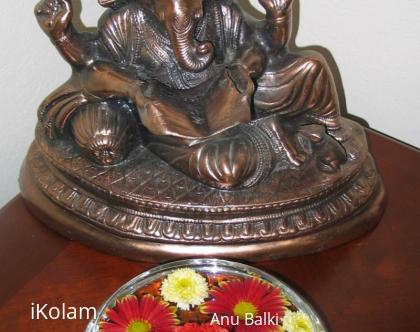 Rangoli: Flowers in glass bowl