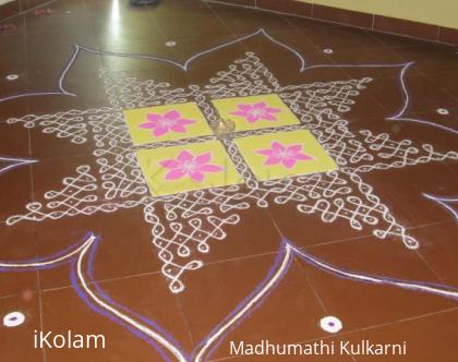 Rangoli: Dotted Rangoli - The line goes like creeper and shapes out like a star