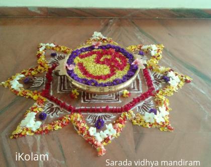 Rangoli: Urli flower decoration 