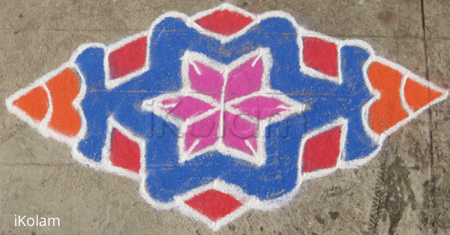 Rangoli: Magenta star