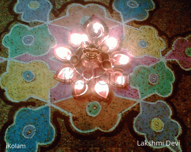 Rangoli: Rangoli with deepam