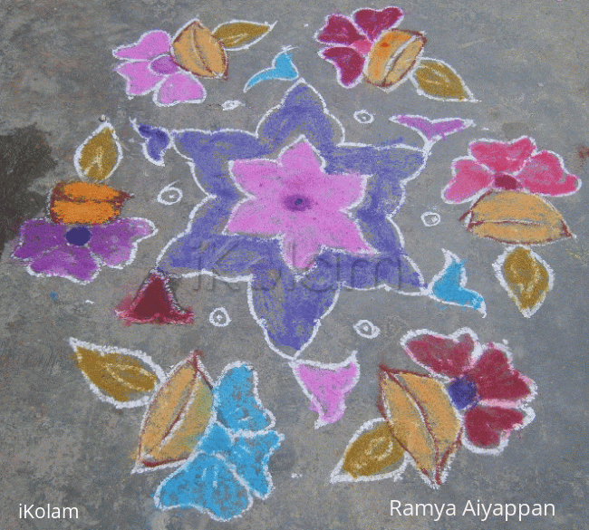 Rangoli: Lamps on flowers