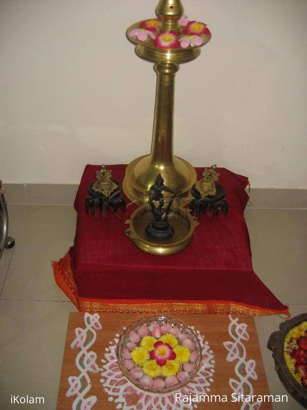 Rangoli: Flower bowl on a rangoli