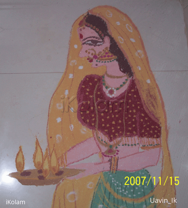 Rangoli: Lady with lamps for Diwali