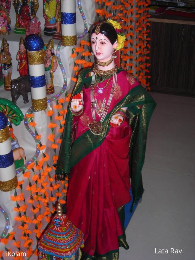 Rangoli: doll dressed up for golu