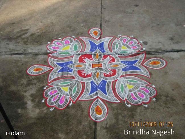 Rangoli: Coloured Kuzhal kolam