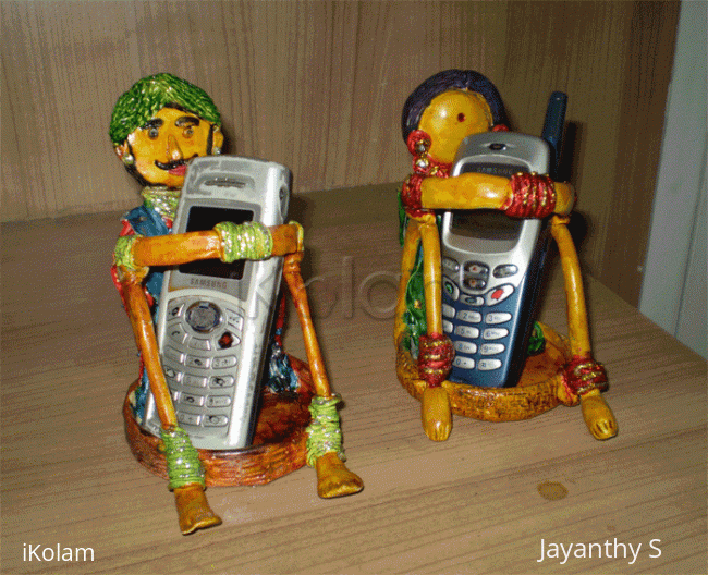 Rangoli: Mobile phone holders