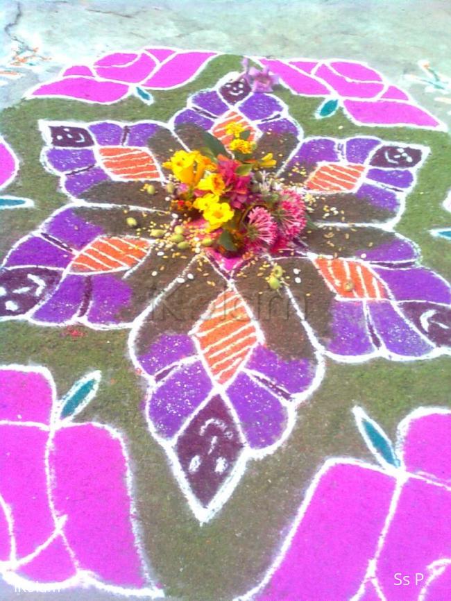 Rangoli: Dolls and flowers