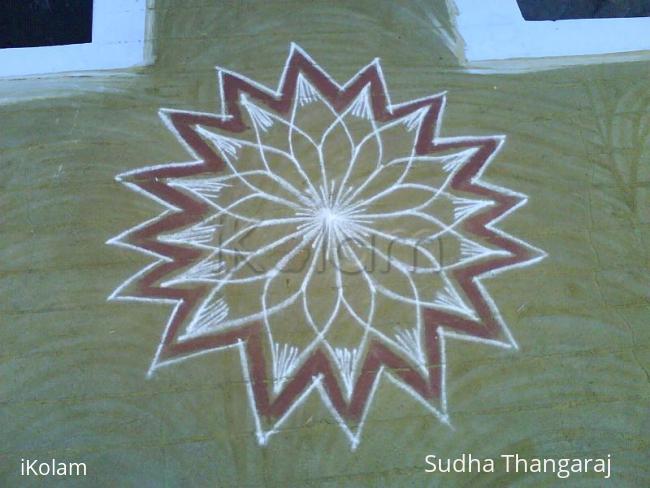 Rangoli: line kolam. by putting thin lines in the form of arc this kolam is finished.