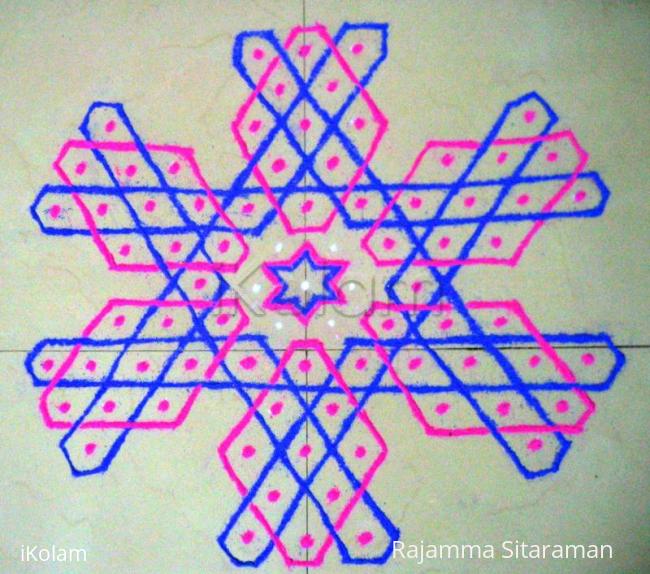 Rangoli: mOhanaji's hexagonal kolam no. 10 on the floor.