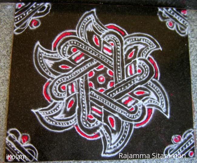 Rangoli: red and white line pulli kolam