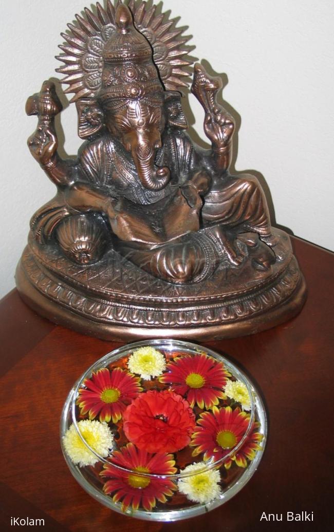 Rangoli: Flowers in glass bowl