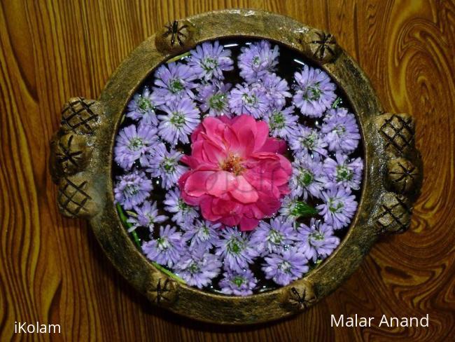 Rangoli: Flowers in a Urli