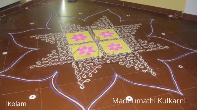 Rangoli: Dotted Rangoli - The line goes like creeper and shapes out like a star