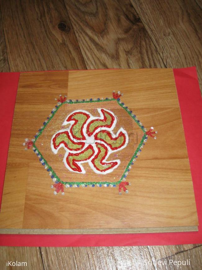 Rangoli: Rangoli  on wooden plank