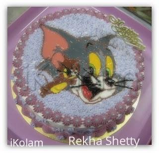 Rangoli: Rekhajerry enjoying the cake