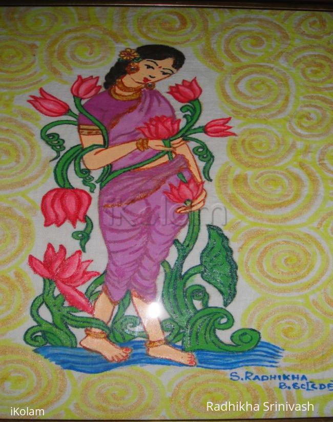 Rangoli: lady painting frame work