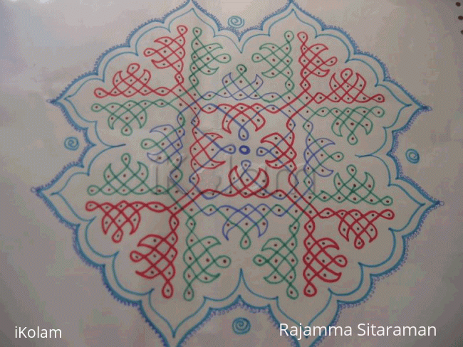 Rangoli: Pullikkolam with design.