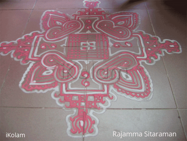 Rangoli: Red and white Padi Kolam