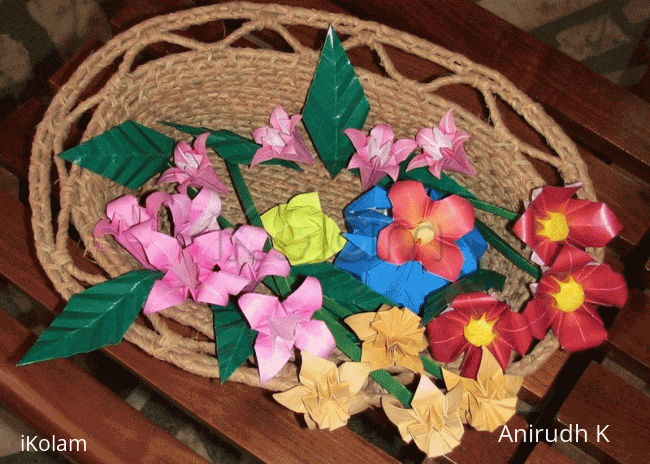 Rangoli: Origami flowers and grass basket