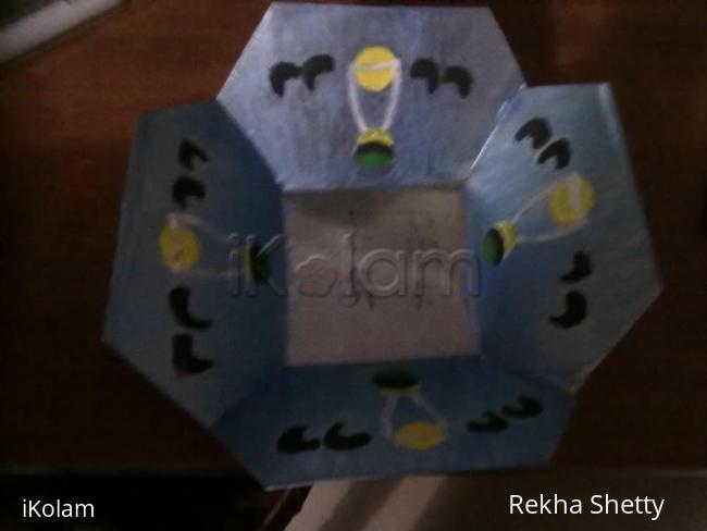 Rangoli: metal basket painting