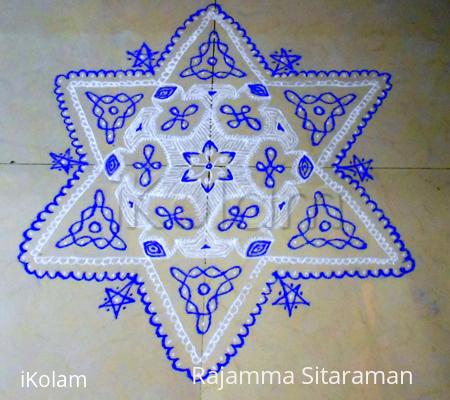 Rangoli: white/violet fusion kolam.