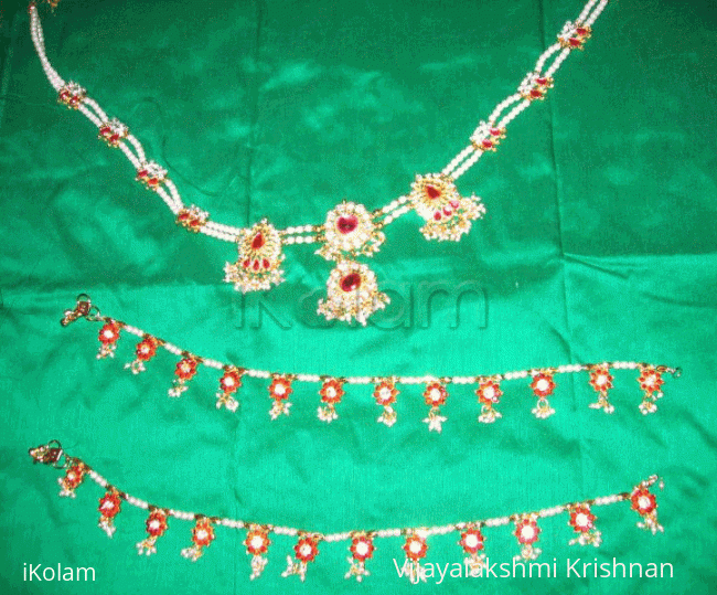 Rangoli: Artificial jewels.