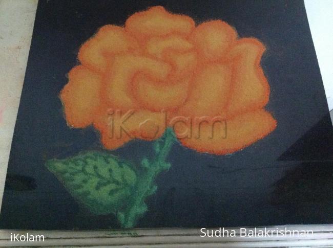 Rangoli: Orange rose