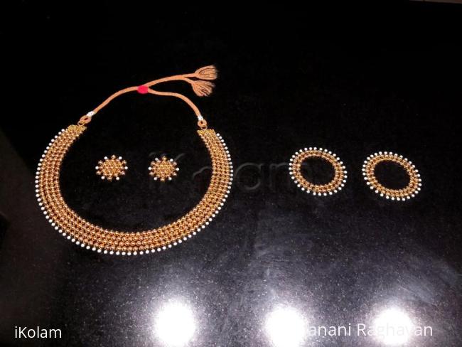 Rangoli: 2018- Navaratri- Welcoming the Universal Goddess with a Gold and Pearl jewellery set...