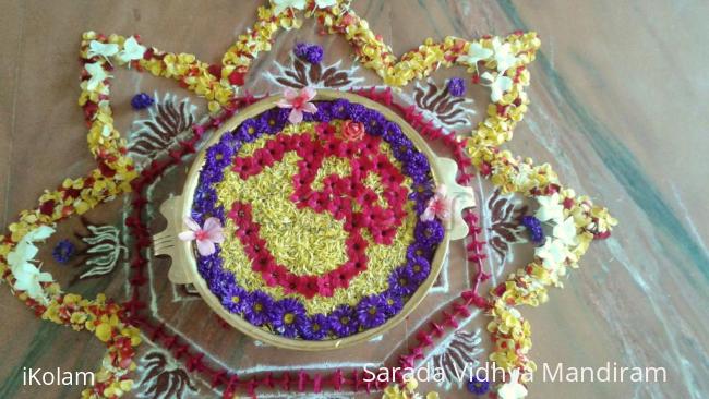 Rangoli: Urli flower decoration 