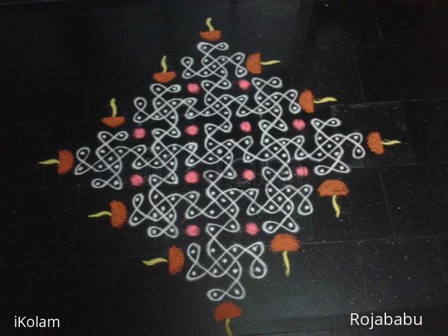 Rangoli: Chikku with diyas