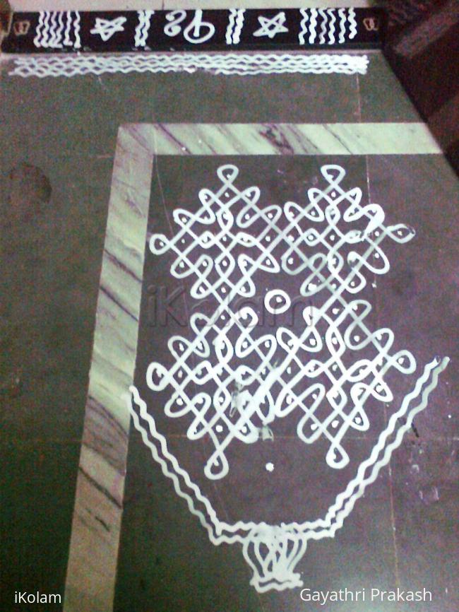 Rangoli: Navami kolam for Navarathri with wet maavu