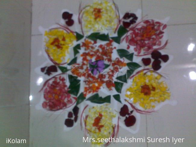 Rangoli: poo kolam drawn at the puja room