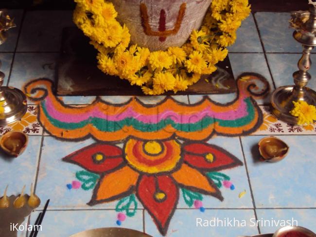 Rangoli: kolam in front of tulsi