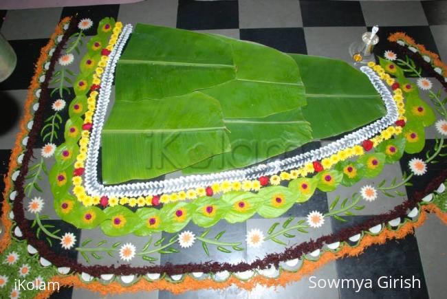 Rangoli: Rangoli around banana leaf