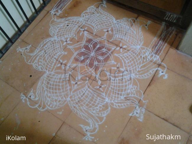 Rangoli: free hand peacock kolam