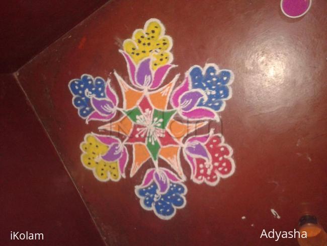 Rangoli: Flower and peacock rangoli