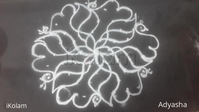 Rangoli: 9 to 5 kolam flower with peacock 