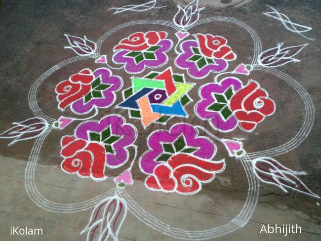 Rangoli: Sangu kolam with flowers