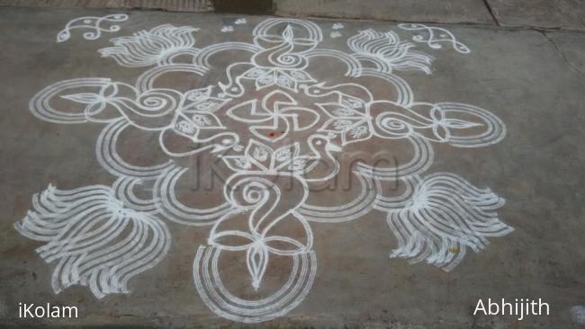 Rangoli: Peacock and sangu Kolam 