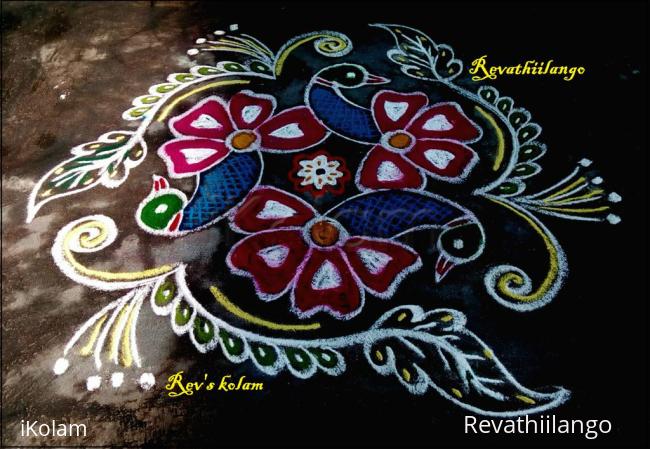 Rangoli: Rev's flower peacock kolam.