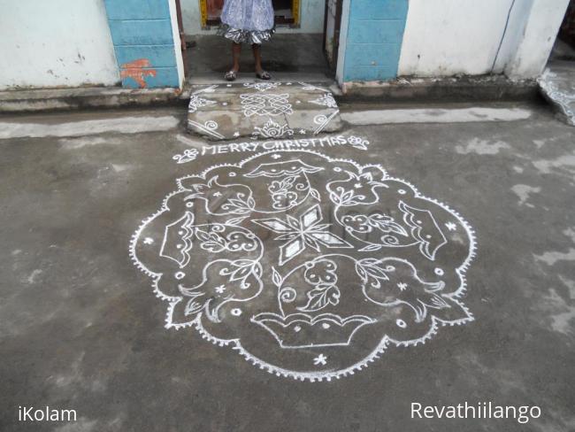 Rangoli: Kolam in white. Christmas.