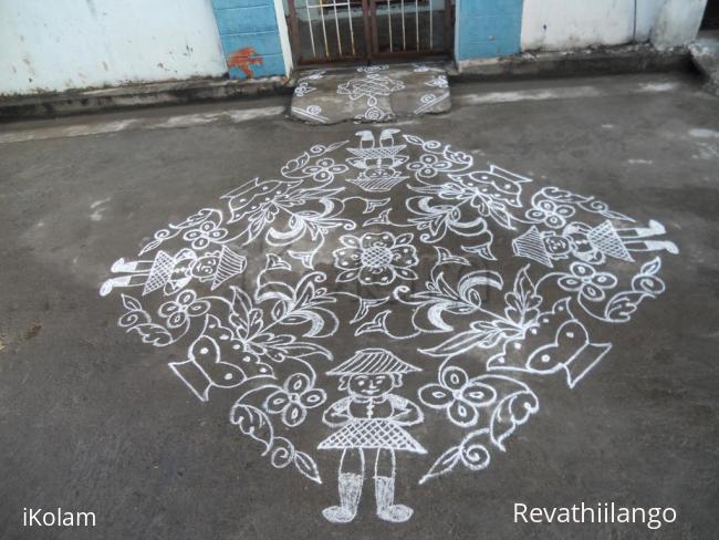 Rangoli: Doll & flower vase. Kolam in white.