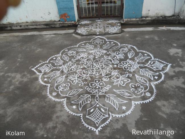 Rangoli: Butterfly & Flower Kolam in White.